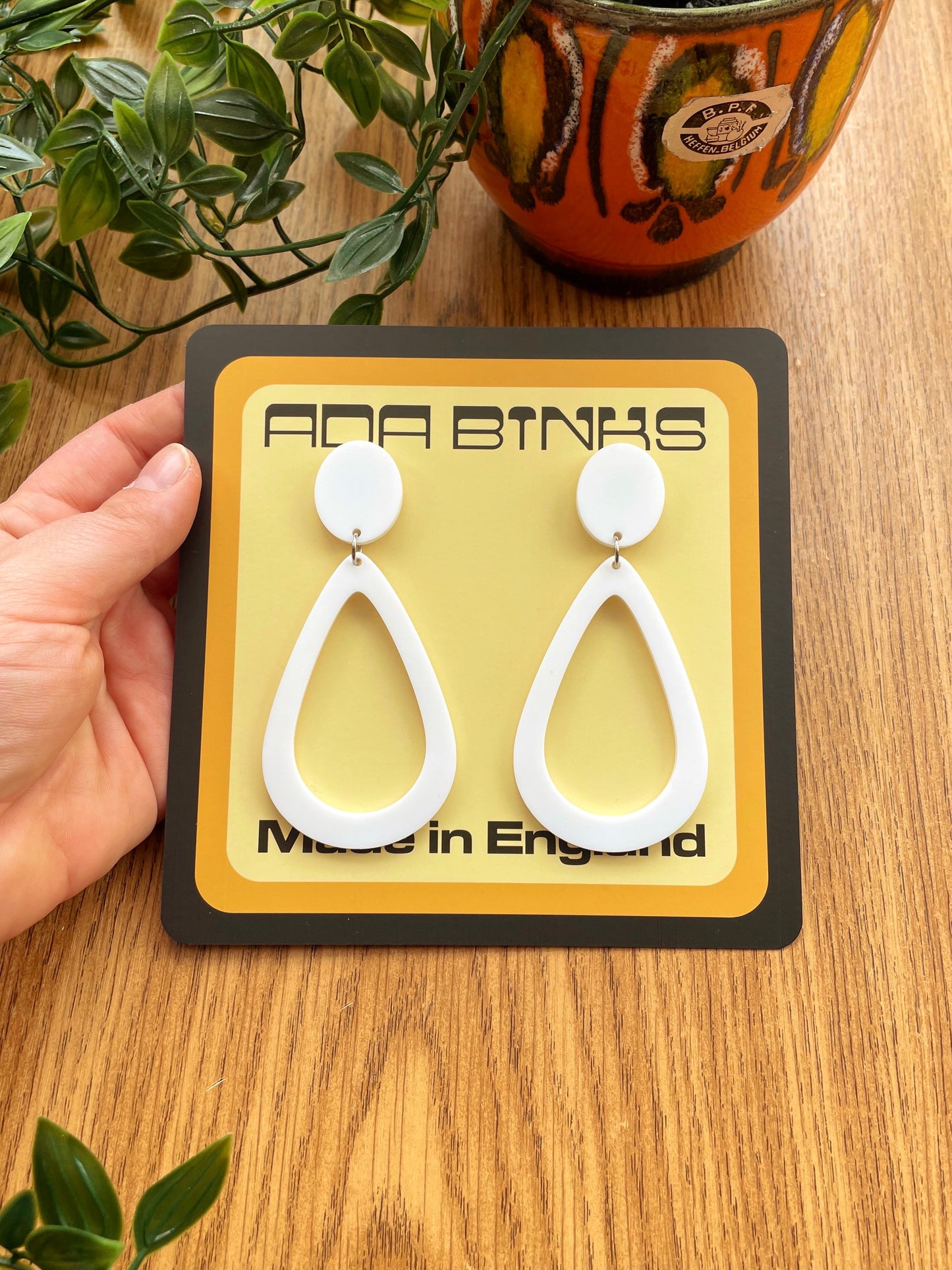 white statement earrings