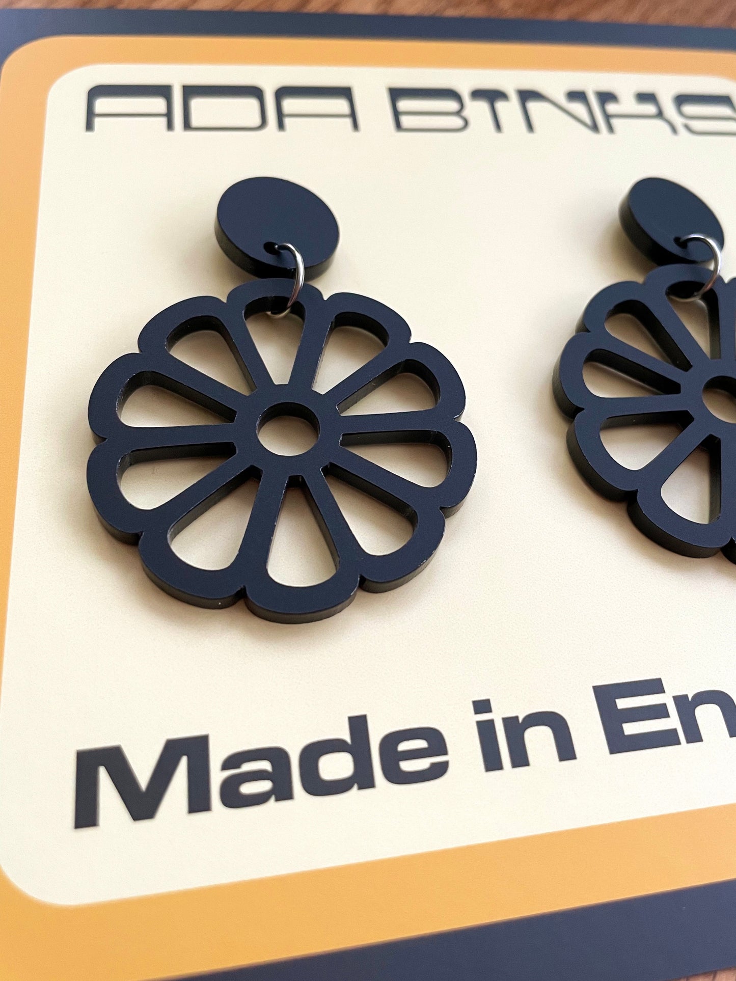 70s black flower earrings